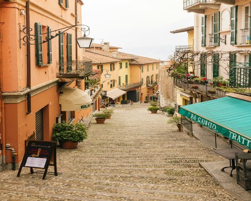 A scenic view of a quiet Italian street showing relaxed lifestyle