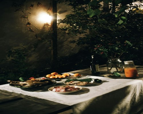 A relaxed evening setting with a glass of water on a rustic table